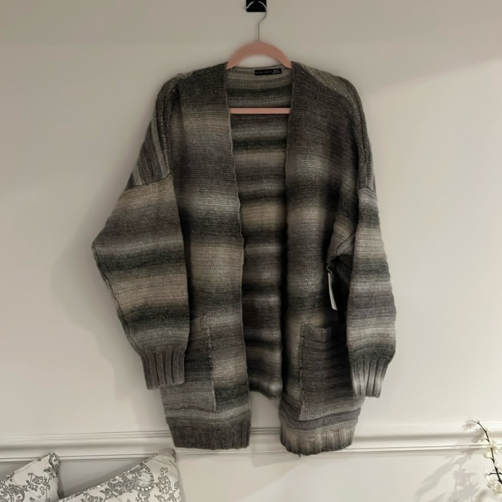 Black tape_ sweater